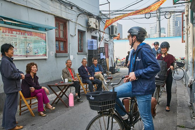 Half-Day Bike Tour of Shanghai Old Town With Food Tasting - Exploration of Traditional Wet Market