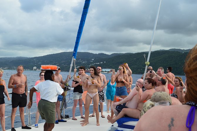 Jamaica Dunns River Falls Party Cruise With Snorkeling - Tips for a Great Experience