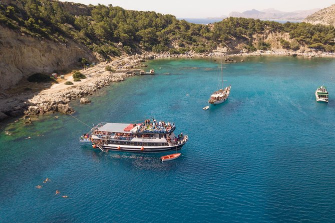 Lindos Day Cruise From Rhodes Town With Swimming Stops and Hotel Transfers - Pickup Locations and Times