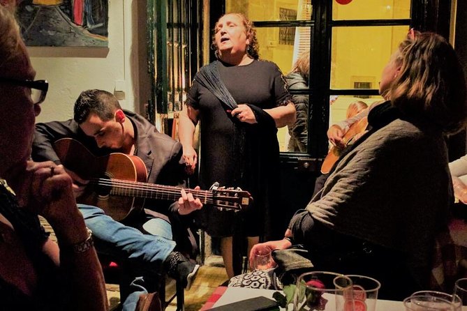 Lisbon Fado Experience: Walking Tour, Dinner and Live Music Show - Savoring Portuguese Specialties and Wine