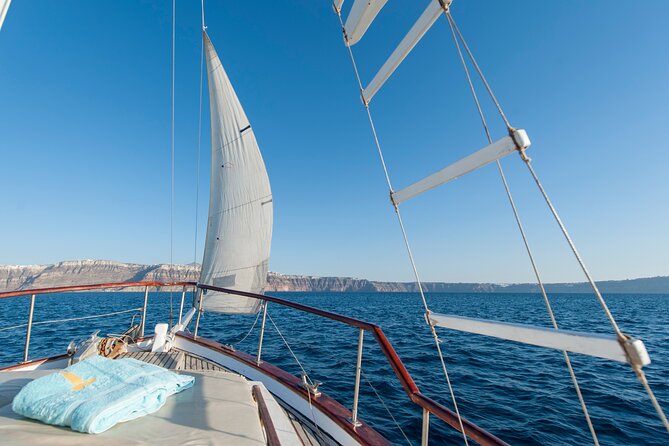 Santorini Caldera Sunset Traditional Cruise With Meal and Drinks - Pickup and Accessibility