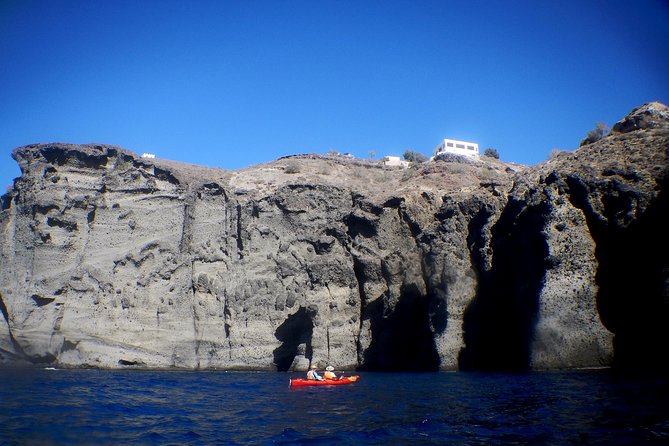 Santorini: Sunset Sea Kayak With Light Dinner - Snorkeling in the Aegean