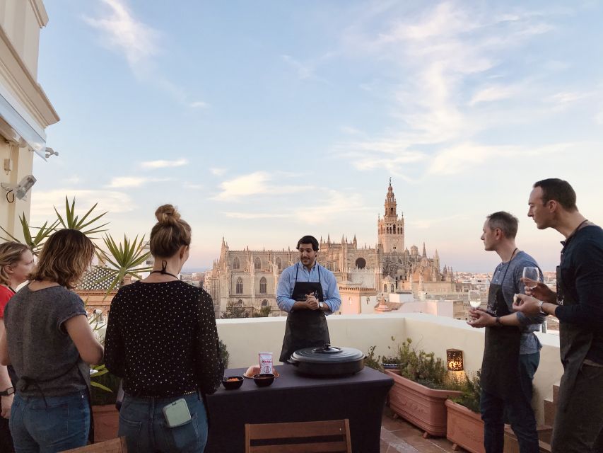 Seville: Private Paella Cooking Class With Cathedral Views - Meeting Point and Location