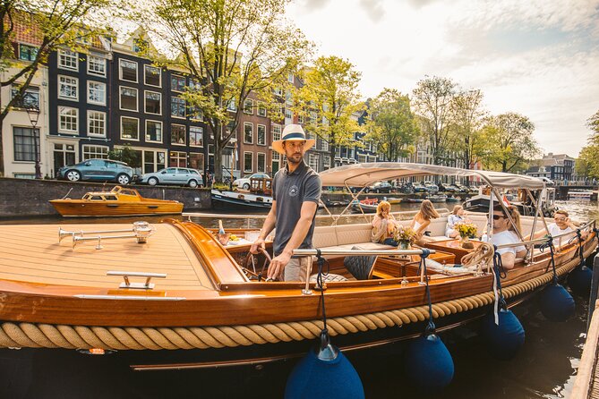 Amsterdam Small-Group Evening Canal Cruise Including Wine, Craft Beer, Cheese - Beverages and Cheese Board