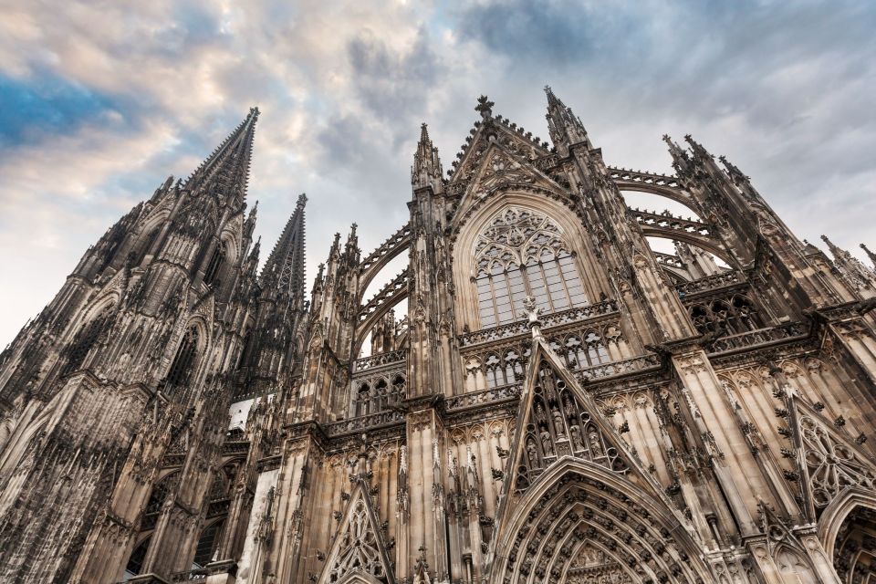 Cologne: Melaten Cemetery With Old Town Private Tour - Rhine River and Park