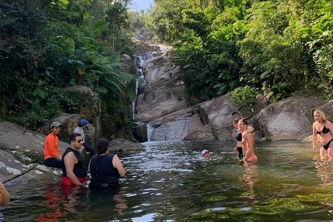 El Yunque: Waterslide, Waterfall, Shopping, and Beach Tour - Activities and Experiences