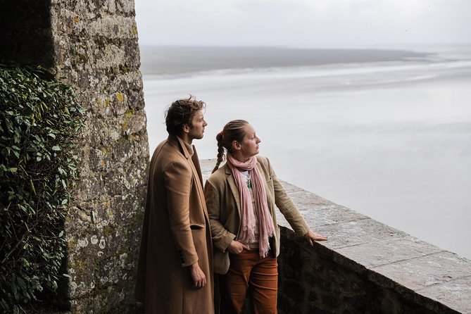 Mont Saint Michel Guided Day Trip With Abbey Entry From Paris - Navigating the Narrow Paths and Steps