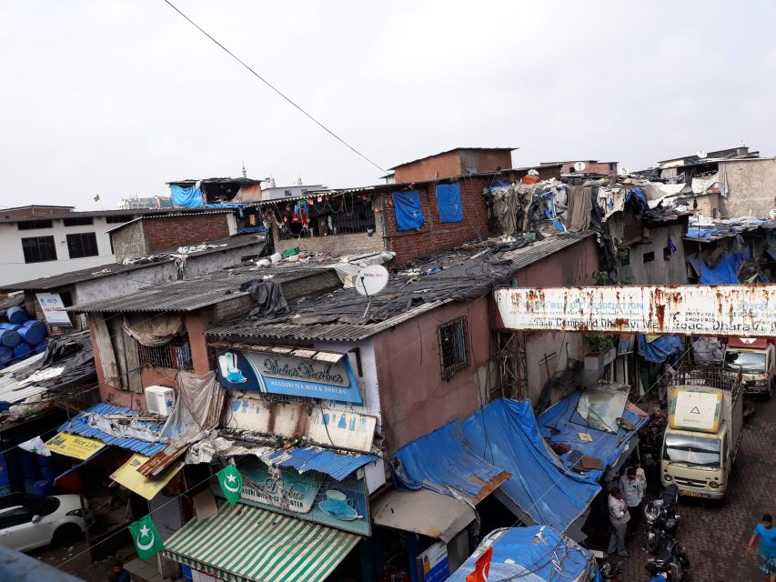 Mumbai: Dharavi Slum and Dhobi Ghat Tour With Train Ride - Unique Tour Experience