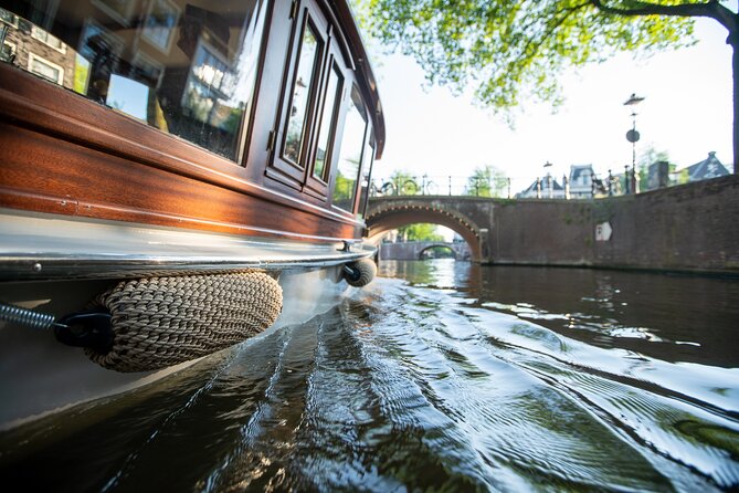 Private Boat Tour Amsterdam - 90 Min Incl. Welcome Drink on Historic Saloon Boat - Accessibility and Participation