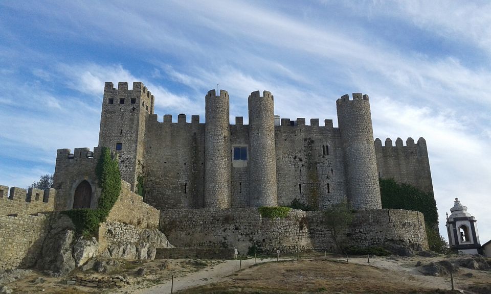 Private Tour to Fatima, Batalha, Nazare, Obidos From Lisbon - Savoring Ginjinha in Óbidos