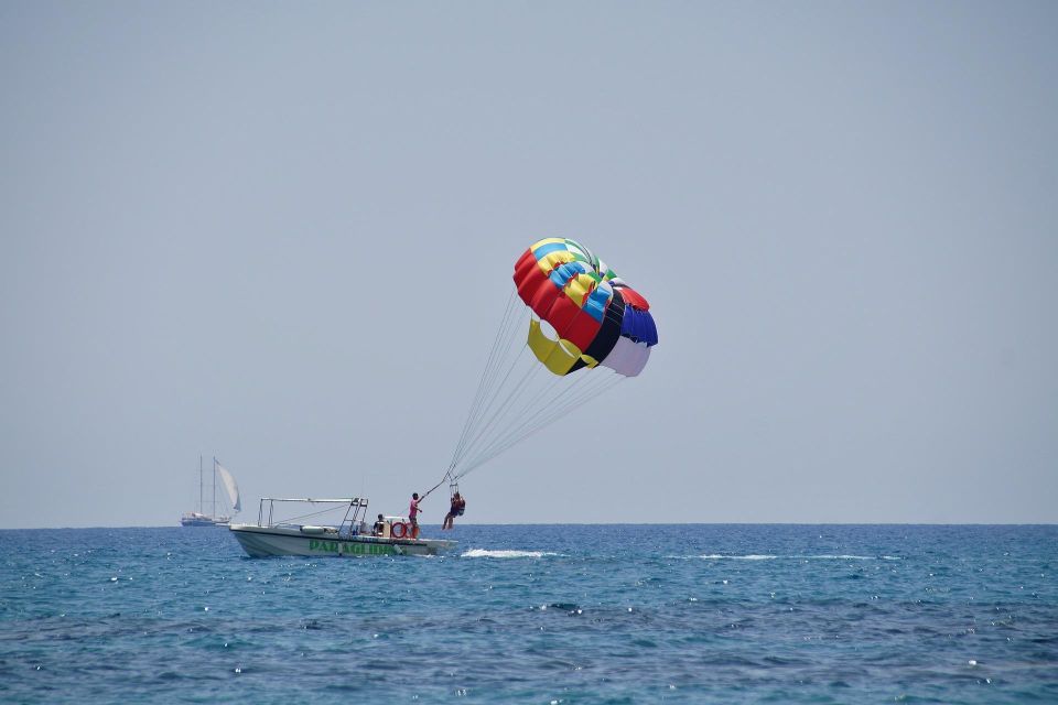 Santorini: Parasailing Flight Experience at Black Beach - Equipment and Attire