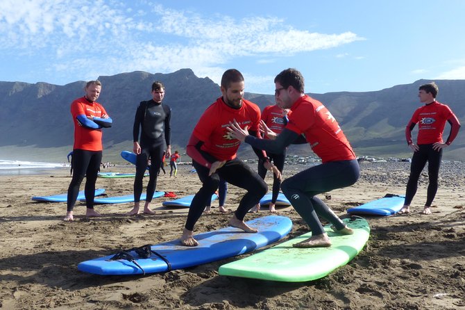Surf Class in Famara 9:15-12:00 or 11:45-14:30 (2h Class) - Meeting and Return Locations