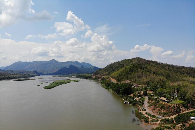 1 DAY Mekong Cruise to Pak Ou Caves. Kuang Si Waterfalls . Local Villages - Visiting the Hmong Village