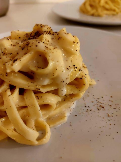 Authentic Pasta Making Class Steps From the Vatican Museums - Saucing and Plating the Dishes