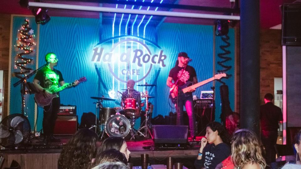 Cancún: Night-time Party Bus Tour & Music at Hard Rock Café - Drinks and Snacks at Hard Rock Cafe