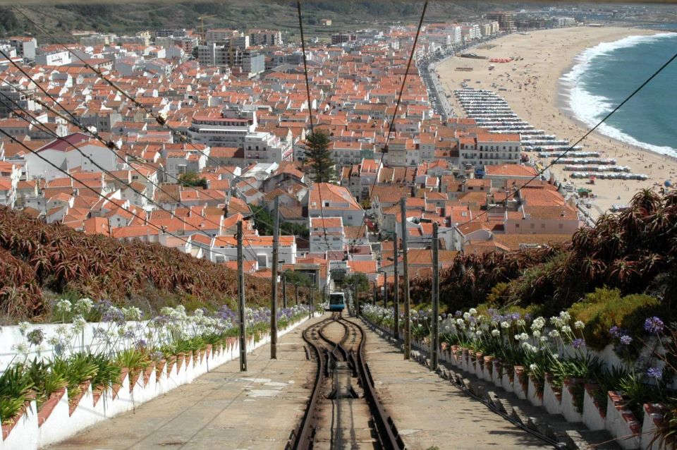 From Lisbon: Fatima, Nazare, Obidos & Batalha Full Day Tour - Lunch in a Traditional Village