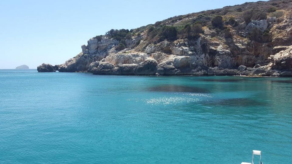 From SantAntioco: Beaches and Coves Mini Dinghy Cruise - Booking Process
