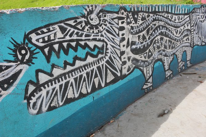 Graffiti Tour in La Candelaria Bogotá With Transportation - Exploring La Candelarias Art Scene