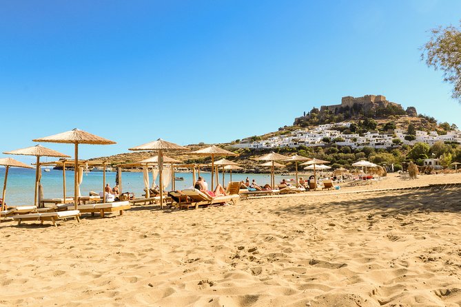 Lindos Day Cruise From Rhodes Town With Swimming Stops and Hotel Transfers - Exploring Lindos Town