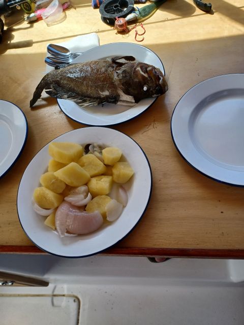 Naxos: Private Fishing Boat Trip With Fresh Onboard Meal - Amenities and Safety Features