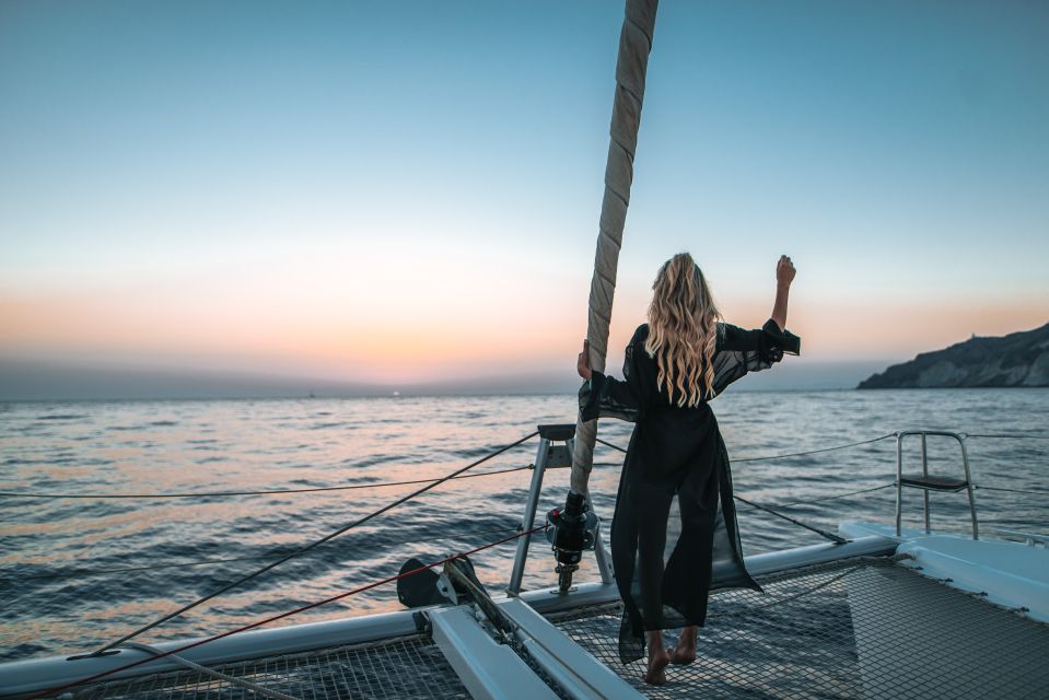 Santorini Catamaran Cruise With Swimming, Meal and Open Bar - Pickup and Requirements