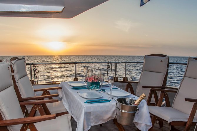 Santorini: Motor Yacht Sunset Cruise With 5-Course Dinner - Activities and Amenities