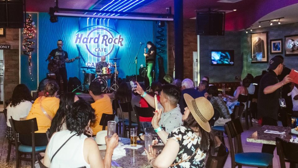 Cancún: Night-time Party Bus Tour & Music at Hard Rock Café - Memorabilia and Live Music