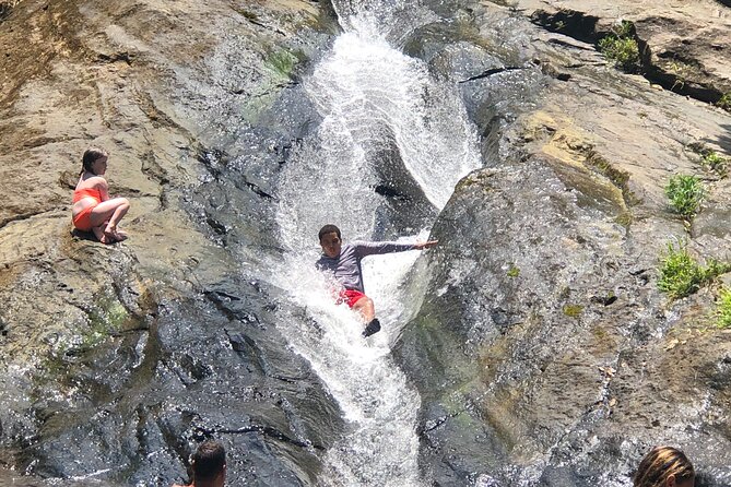 El Yunque: Waterslide, Waterfall, Shopping, and Beach Tour - Tips for Travelers