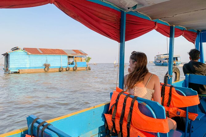 Floating Village Sunset Boat Vespa Tour - Visiting Tonle Sap Lake