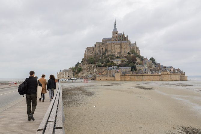 Mont Saint Michel Day Trip With Abbey Entrance From Paris - Walking Requirements and Weather Conditions