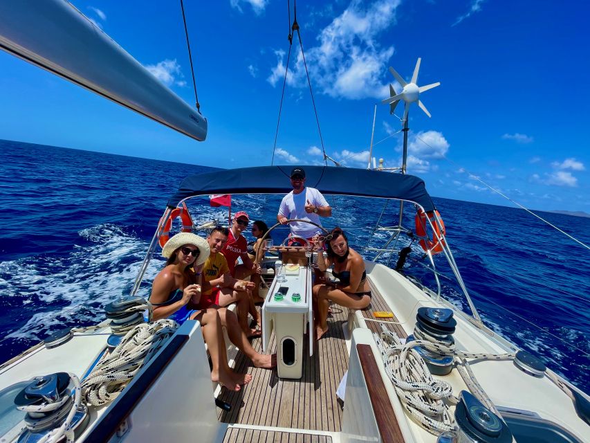Morro Jable: Sailing Boat Excursion With Food and Drinks - Swimming and Snorkeling