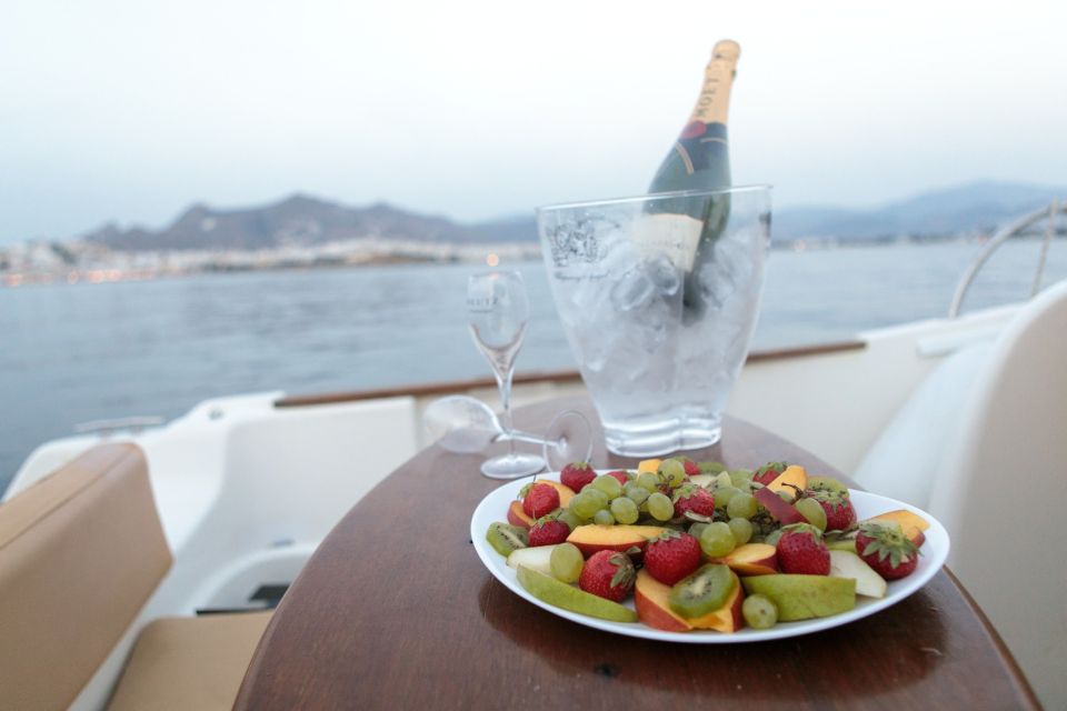 Naxos: Private Sunset Boat Tour With Fruit and Champagne - Ideal for Romantic Getaways