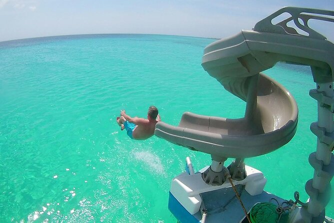 Private Catamaran Adventure Cruise With Rope Swing and Water Slide - Booking Process