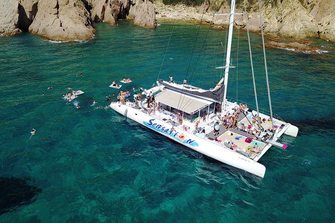 Sailing Along the Costa Brava in a Large Catamaran With a Buffet Barbecue and Bathing Inlet. Drinks Are Included. - Cancellation Policy