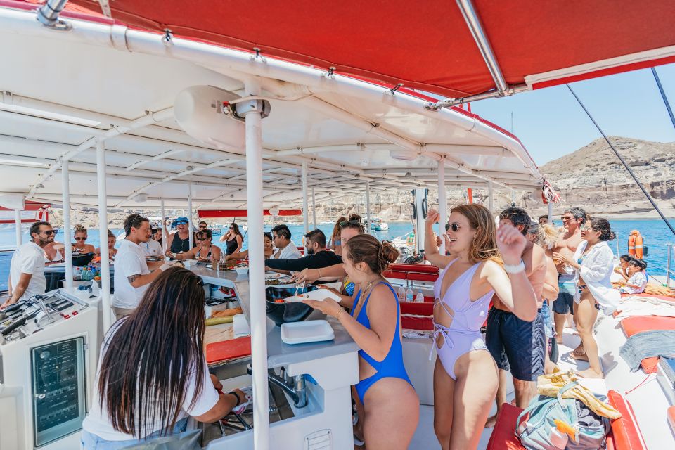 Santorini: Catamaran Tour With BBQ Dinner, Drinks, and Music - Sunset or Morning Option