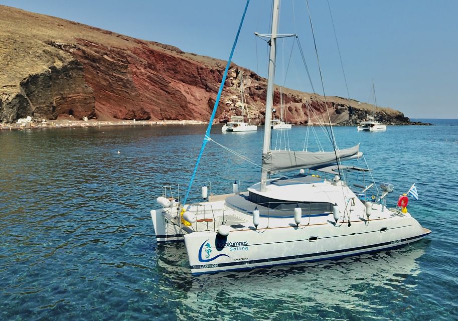 Santorini: Private Catamaran Excursion With Food and Drinks - Onboard Amenities