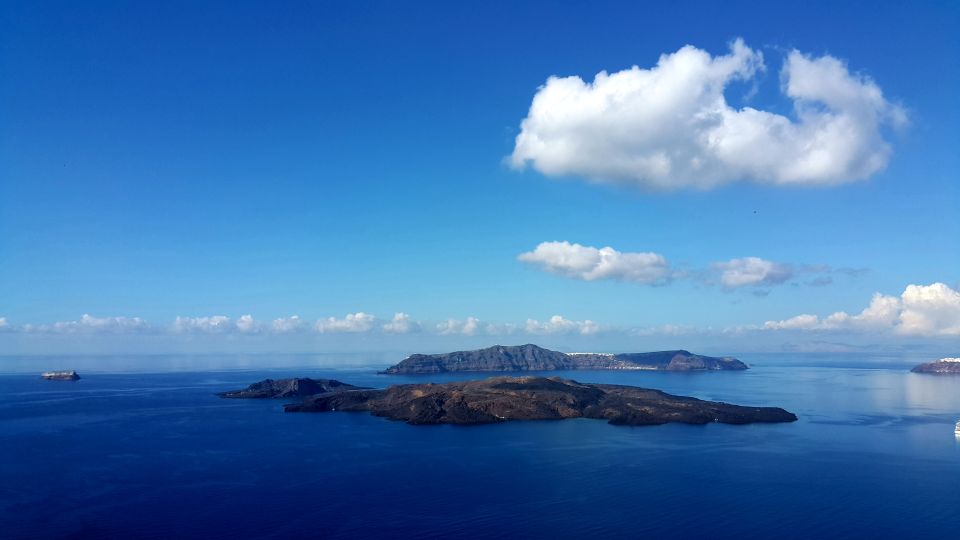 Fira: Santorini Shore Excursion With Guide - Strolling Through the Charming Oia