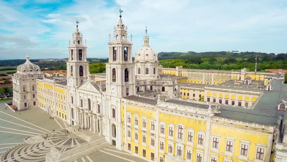 From Lisbon or Cascais: Mafra, Ericeira, and Queluz Day Tour - Language Options and Cancellation Policy