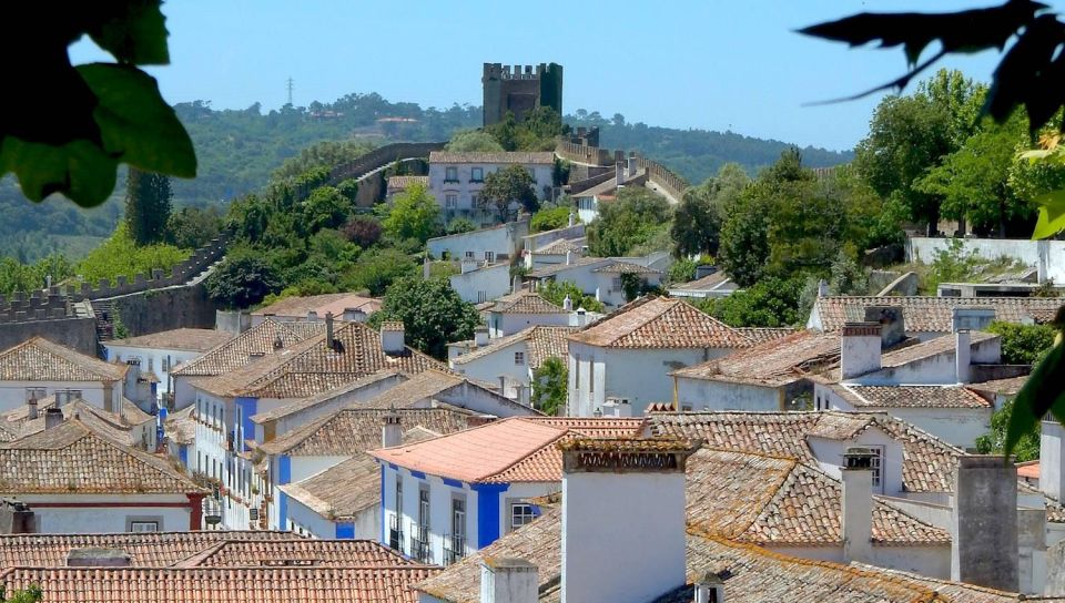 From Lisbon: Queluz Palace, Nazaré and Óbidos Day Trip - Queluz National Palace