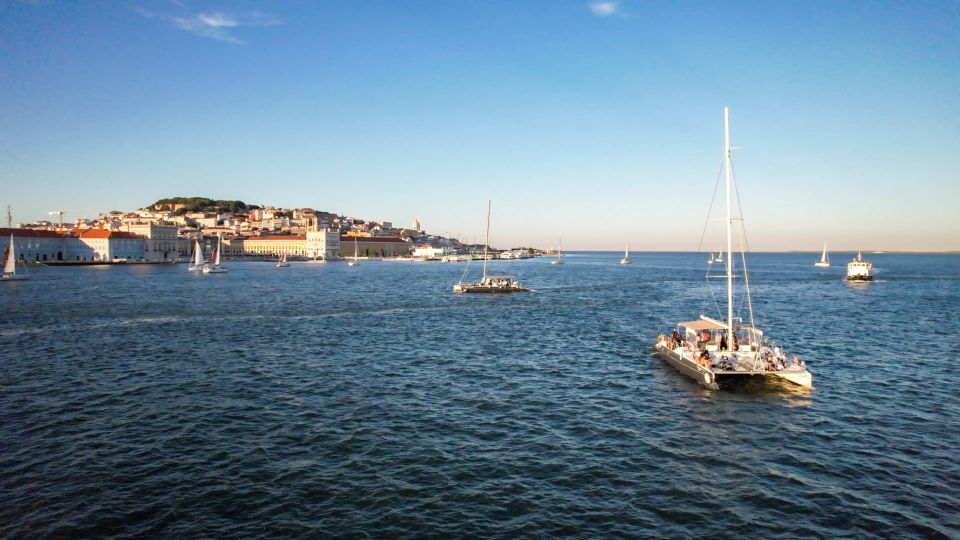 Lisbon: Sunset Catamaran Tour With Music and Drink - What to Expect on Board