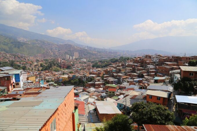 Medellin: Barrio Transformation Tour - Booking and Cancellation Policy