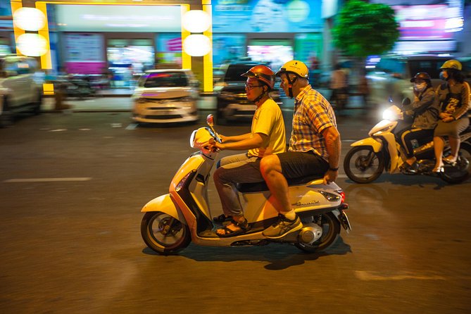 Saigon Night Street Food and City Tour on Scooter - Nighttime Sights