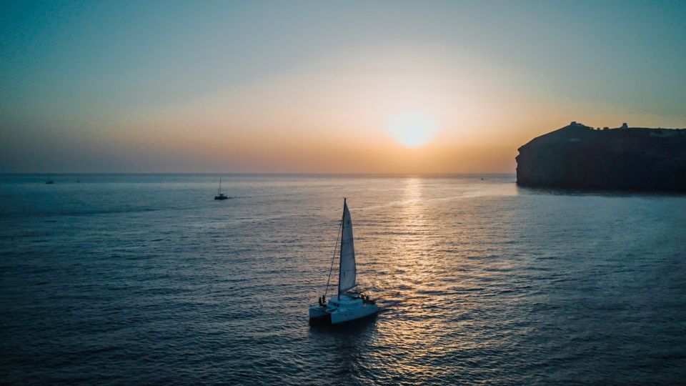 Santorini Catamaran Cruise With Swimming, Meal and Open Bar - Booking and Availability