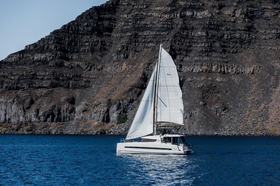 Santorini Catamaran Daytime Coastal Cruise - Booking and Cancellation Policy