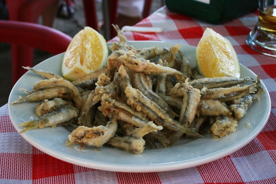 Seville: 3-Hour Guided Tapas Tour in Seville - Tour Inclusions and Participants