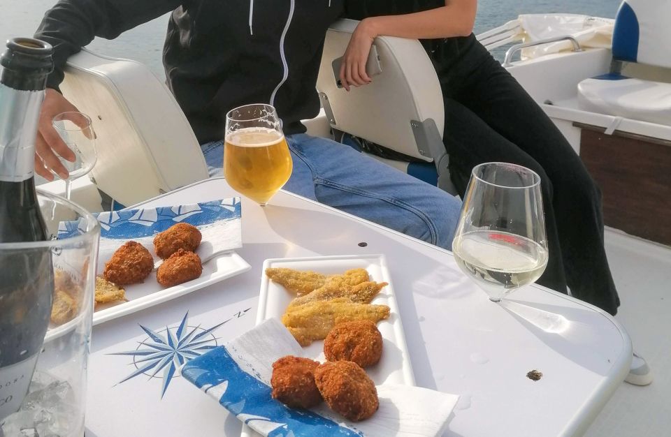 Sunset Boat Cruise With Wine and Fish Tasting - Tasting Experience