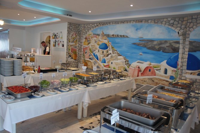 Traditional Greek Night Live Music & Dinner Show in Santorini - Meeting and Pickup