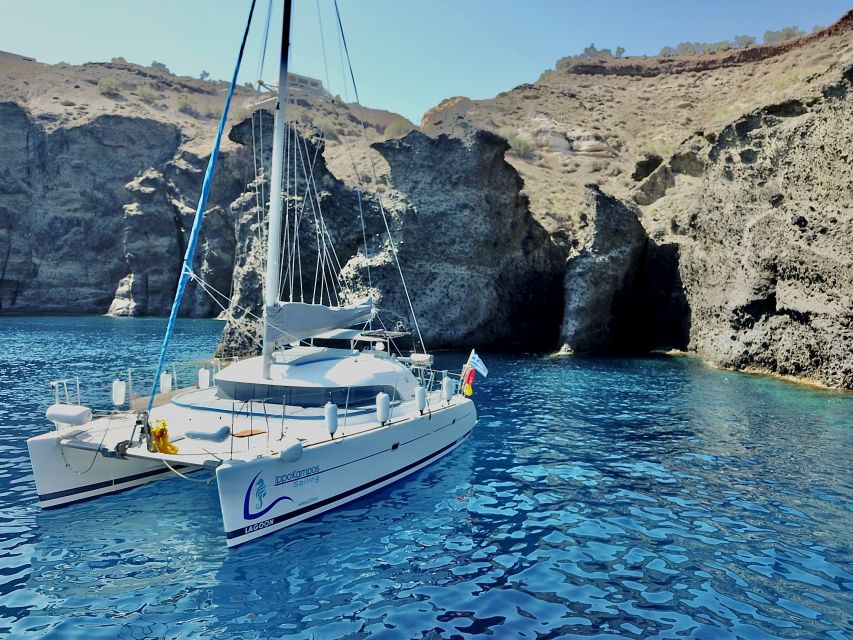 Santorini: Private Catamaran Excursion With Food and Drinks - Unique Experiences