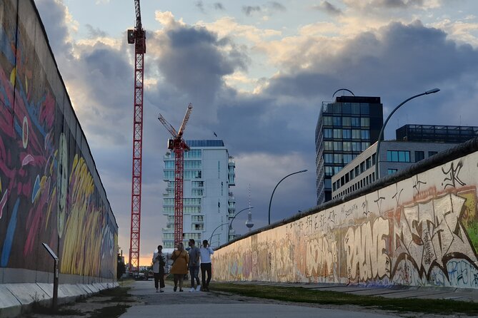 Small Group Walking Tour of East Berlin With a French Guide - Exploring Cold War History