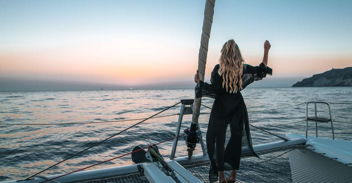 Santorini Catamaran Cruise With Swimming, Meal and Open Bar - Frequently Asked Questions